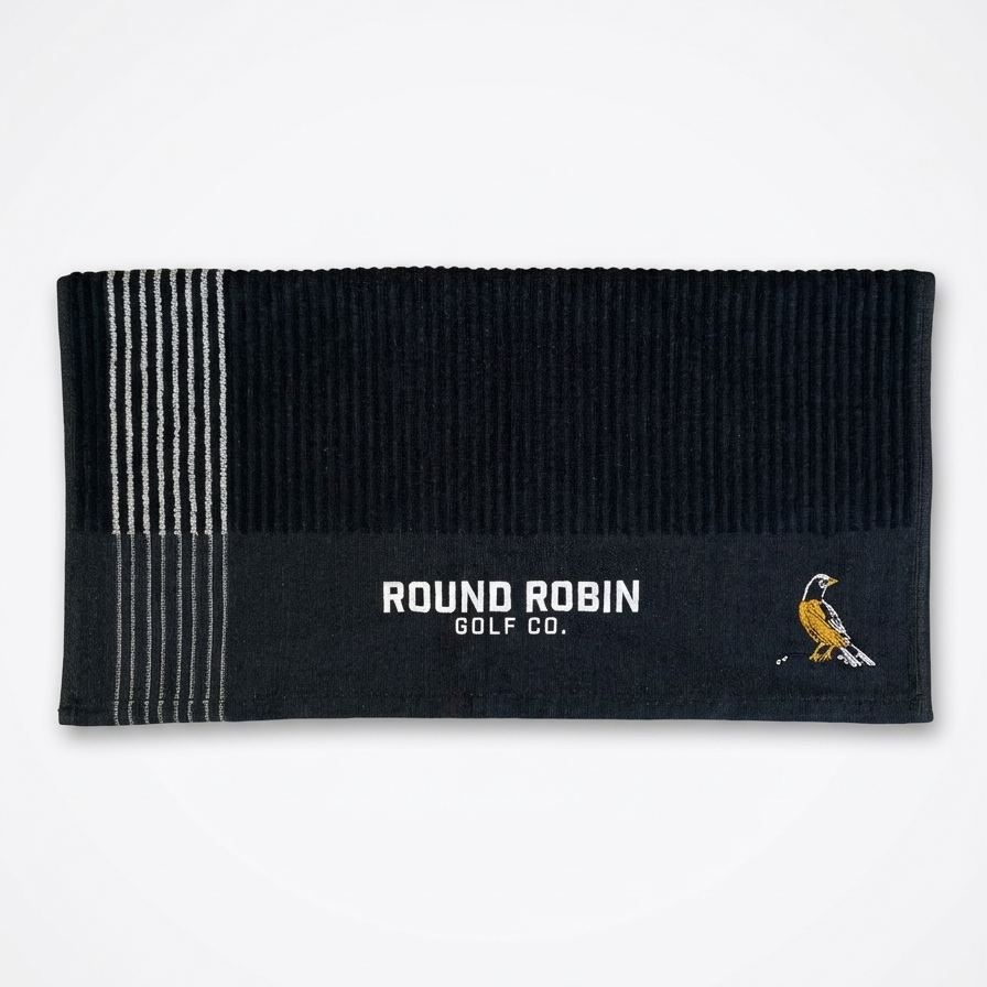 Black golf towel with white stripes and 'Round Robin Golf Co.' logo on a white background
